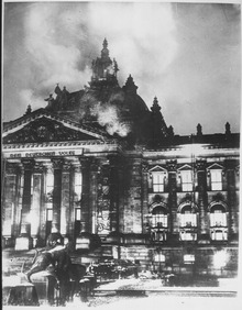 lossy-page1-220px-Firemen_work_on_the_burning_Reichstag_Building_in_February,_1933,_after_fire_broke_out_simultaneously_at_20_places...._-_NARA_-_535790.tif